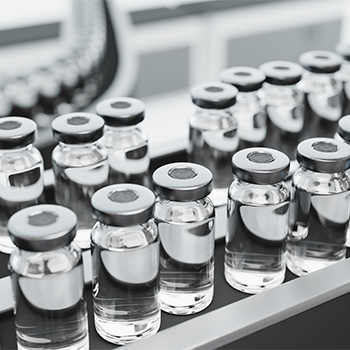 Pharma Industry. Drug viles on conveyor belt